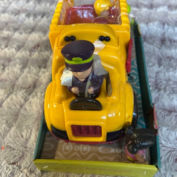 B. Boogie Bus Yellow School Bus
Toy with Lights, Sounds